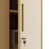 Close-up of a beige metal cabinet door with a key in the lock. Produktbild-Vorschau