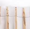 A close-up view of a wooden fence with wire. Produktbild-Vorschau