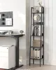 A tall, narrow ladder shelf filled with books and decorative items, placed next to a standing desk in an office setting. Náhled obrázku produktu