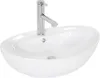 A white ceramic oval basin with a chrome faucet, shown from a diagonal angle against a white background. Náhled obrázku produktu