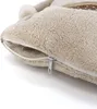 A close-up view of a beige plush blanket with an open zipper. Produktbild-Vorschau