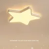 A star-shaped ceiling light fixture illuminated against a light background. Náhled obrázku produktu
