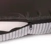 A close-up view of a partially unzipped pet bed, showing the fabric texture and the inner filling. Náhľad obrázku produktu