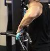 A person using a pull-up bar grip attachment in a gym. Náhľad obrázku produktu