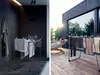 A split image showing a drying rack in a modern bathroom and on a wooden deck outside a modern house. Produktbild-Vorschau
