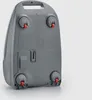 The underside of a gray appliance with wheels. Podgląd zdjęcia produktu