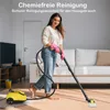 A woman is cleaning a carpet with a steam cleaner in a living room. Produktbild-Vorschau