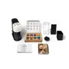 A Nespresso Vertuo Next coffee machine and accessories are laid out on a white background. Produktbild-Vorschau