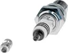 A close-up, studio shot of a spark plug and a small metal component against a white background. Podgląd zdjęcia produktu