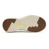 The sole of a shoe is shown against a white background. Voir les images du produit