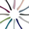A collection of colorful cutlery handles arranged in a circular pattern against a white background. Anteprima dell’immagine prodotto