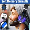 A man wearing a beanie is wearing gaming headphones with blue LED lights. Produktbild-Vorschau