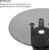 A close-up view of a table heater with a glass top, highlighting its features and robustness. Produktbild-Vorschau