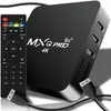 A black Android TV box and its remote control are shown on a white background. Anteprima dell’immagine prodotto