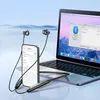 A pair of black wireless earbuds connected to a smartphone and a laptop, demonstrating Bluetooth connectivity. Anteprima dell’immagine prodotto