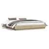 A bed frame with bedding and pillows, shown from a side angle against a white background. Produktbild-Vorschau