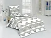 A bed with bedding and a pillow in a room. Produktbild-Vorschau