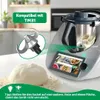 A kitchen scene showing a food processor with a dough blade and a ball of dough on a counter. Produktbild-Vorschau