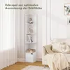 A white corner shelf unit is placed in a room next to a sofa. The shelf unit has books and decorative items on it. The room has white curtains and wooden flooring. Produktbild-Vorschau
