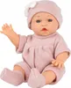 A baby doll dressed in pink knitted clothing, sitting on a white background. Produktbild-Vorschau