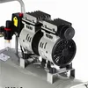 A close-up view of an air compressor's motor and tank. Anteprima dell’immagine prodotto