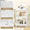 A white rolling storage cart filled with books, pencils, and decorative items, with close-up insets highlighting features like ventilation, handles, and basket depth. Anteprima dell’immagine prodotto