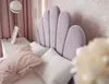 A bedroom scene with a bed, pillows, and curtains. Produktbild-Vorschau