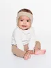 Dooky Kopfband-Gehörschutz für Babys 6-12 Monate Beige Produktbild-Vorschau 2