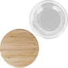 A clear glass storage jar with a bamboo lid, shown from a top-down perspective. Produktbild-Vorschau