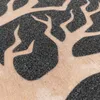 A close-up view of a wooden balance board with a tree design. Anteprima dell’immagine prodotto