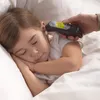 A child is sleeping in bed while an adult uses an ear thermometer to take their temperature. Produktbild-Vorschau