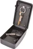 An open black key safe with keys inside. Produktbild-Vorschau