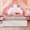 A child's bed with a crown-shaped headboard and LED lighting, decorated with pink drapes and fairy lights. Náhled obrázku produktu