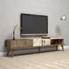 A TV stand with a television on it, placed against a wall. Anteprima dell’immagine prodotto