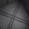 A close-up view of the underside of a black rattan furniture set, showing the woven texture and metal support structure. Produktbild-Vorschau
