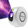 A white galaxy projector emitting a purple and pink nebula effect. Podgląd zdjęcia produktu