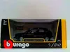 A black Bburago model car, a Volkswagen Golf 1 GTI 1979, is displayed in its original packaging. Náhled obrázku produktu