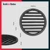 A diagram showing a round metal grate with dimensions and branding. Produktbild-Vorschau