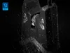 A close-up of a black fishing bite alarm with water droplets on it, suggesting it is waterproof or has been exposed to rain. Produktbild-Vorschau