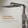 A close-up marketing image of a modern shower system, featuring a large square showerhead and a handheld showerhead, against a neutral background with descriptive text. Anteprima dell’immagine prodotto
