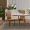 A dining set with chairs and a table in a well-lit room. Produktbild-Vorschau