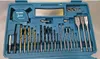 A tool kit containing various drill bits and a tape measure, neatly organized in a blue plastic case. Náhled obrázku produktu
