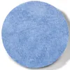 A circular blue bath mat on a white background. Anteprima dell’immagine prodotto