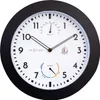 A close-up of a round wall clock with a black frame and a white face. Náhled obrázku produktu