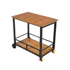 A wooden and metal serving cart with wheels, shown against a white background. Produktbild-Vorschau