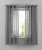 A window with gray curtains and sheer white curtains, showing a vase with a decorative branch on the windowsill. Produktbild-Vorschau