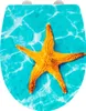 A toilet seat with a starfish design on a blue water background. Produktbild-Vorschau