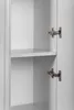 Close-up view of the interior of a white cabinet, showing two shelves and two metal hinges on the right door. Anteprima dell’immagine prodotto