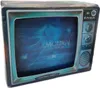 A product box designed to look like an old television set, displaying a scene from a game. Produktbild-Vorschau