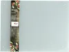 A glass cutting board with a product label on the left side. Produktbild-Vorschau